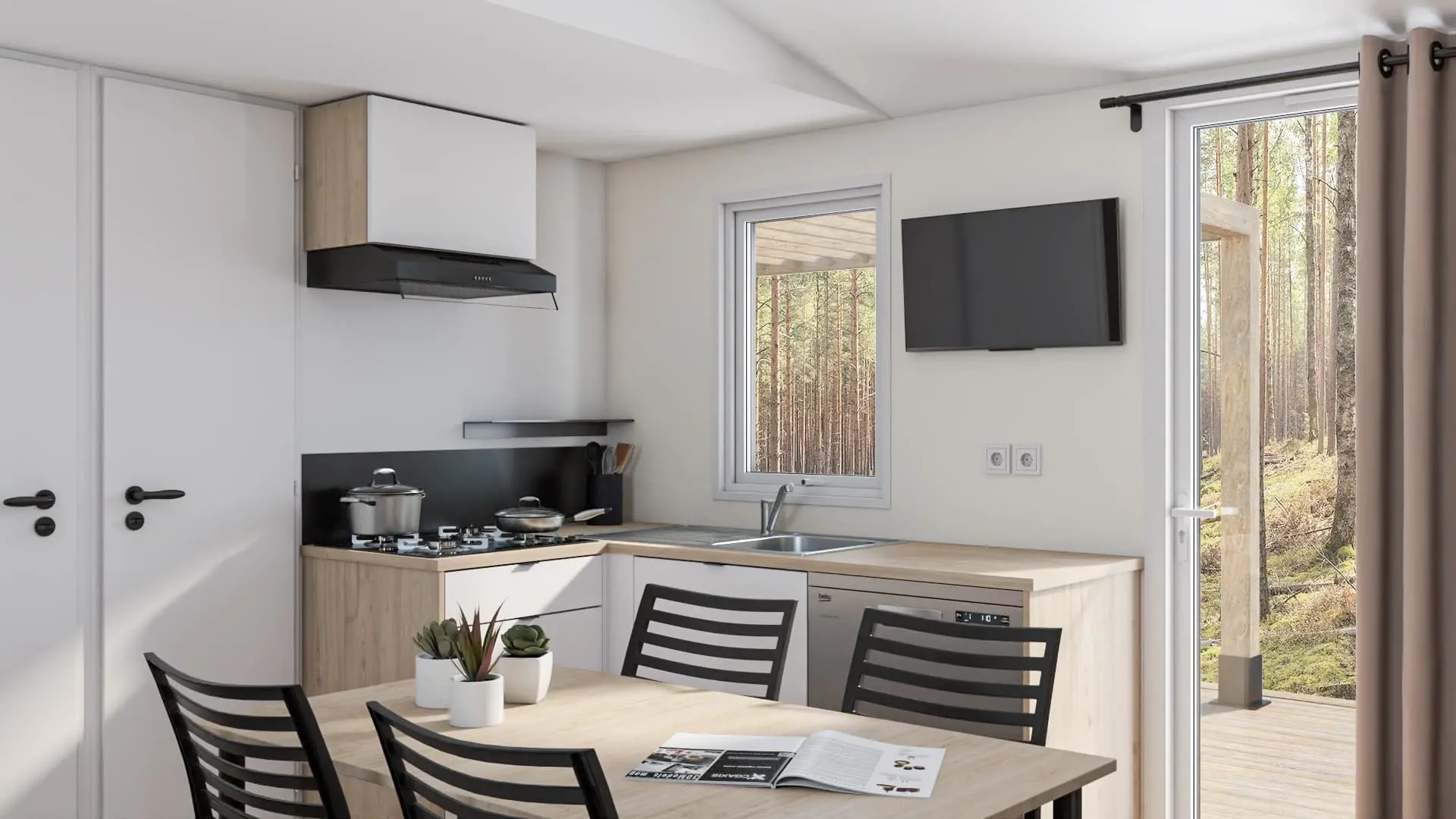 Cuisine moderne avec table et vue forêt.